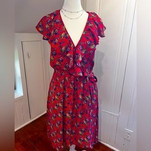 Anthropologie (Maeve) red crepe floral print faux wrap ruffle dress.